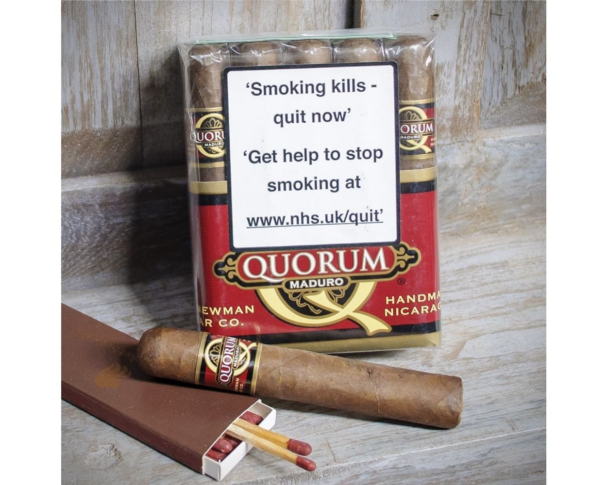 jc-newman-quorum-maduro-robusto-box-min-1.jpg Quorum Robusto Maduro Cigars – Pack of 10