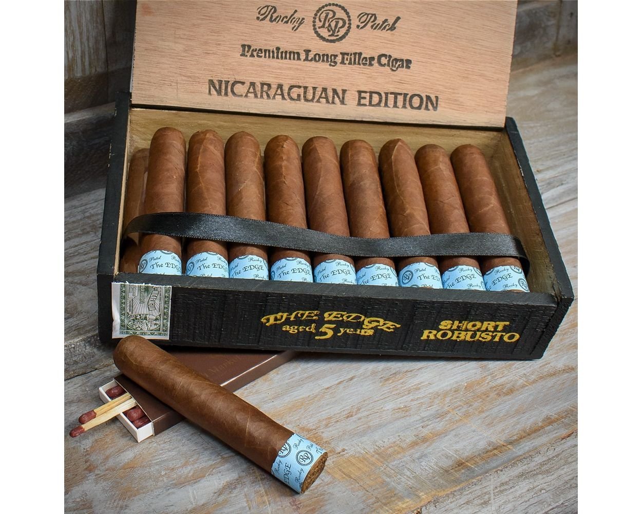 the-edge-aged-5-years-nicaraguan-edtion-short-robusto-box-min_1-1.jpg Rocky Patel The Edge Nicaraguan Short Robusto Cigars – Box of 20